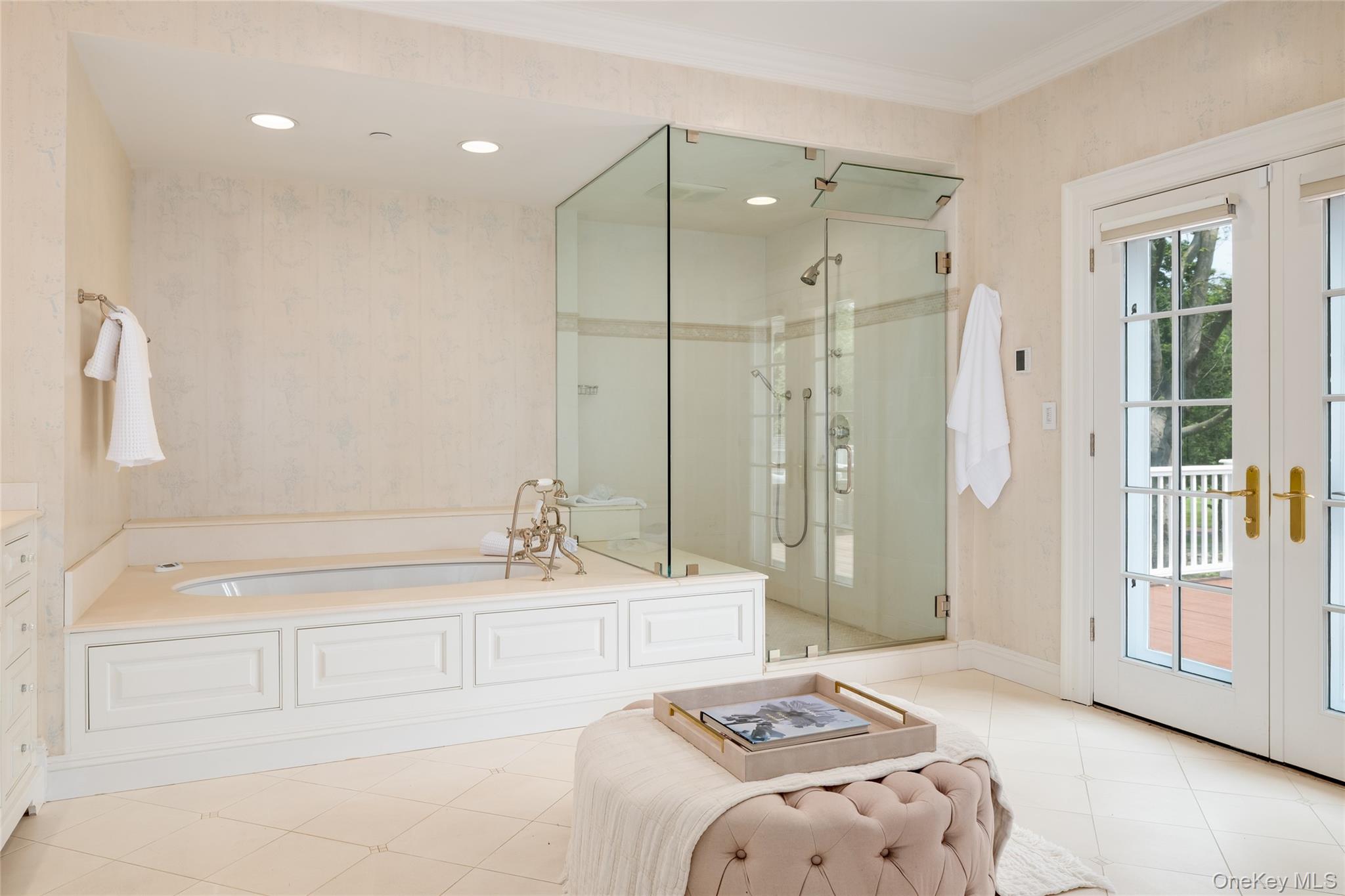 21 Dorann Road Purchase, NY 10577 - Photo 26 of 39 a bathroom with a bathtub a sink and a shower