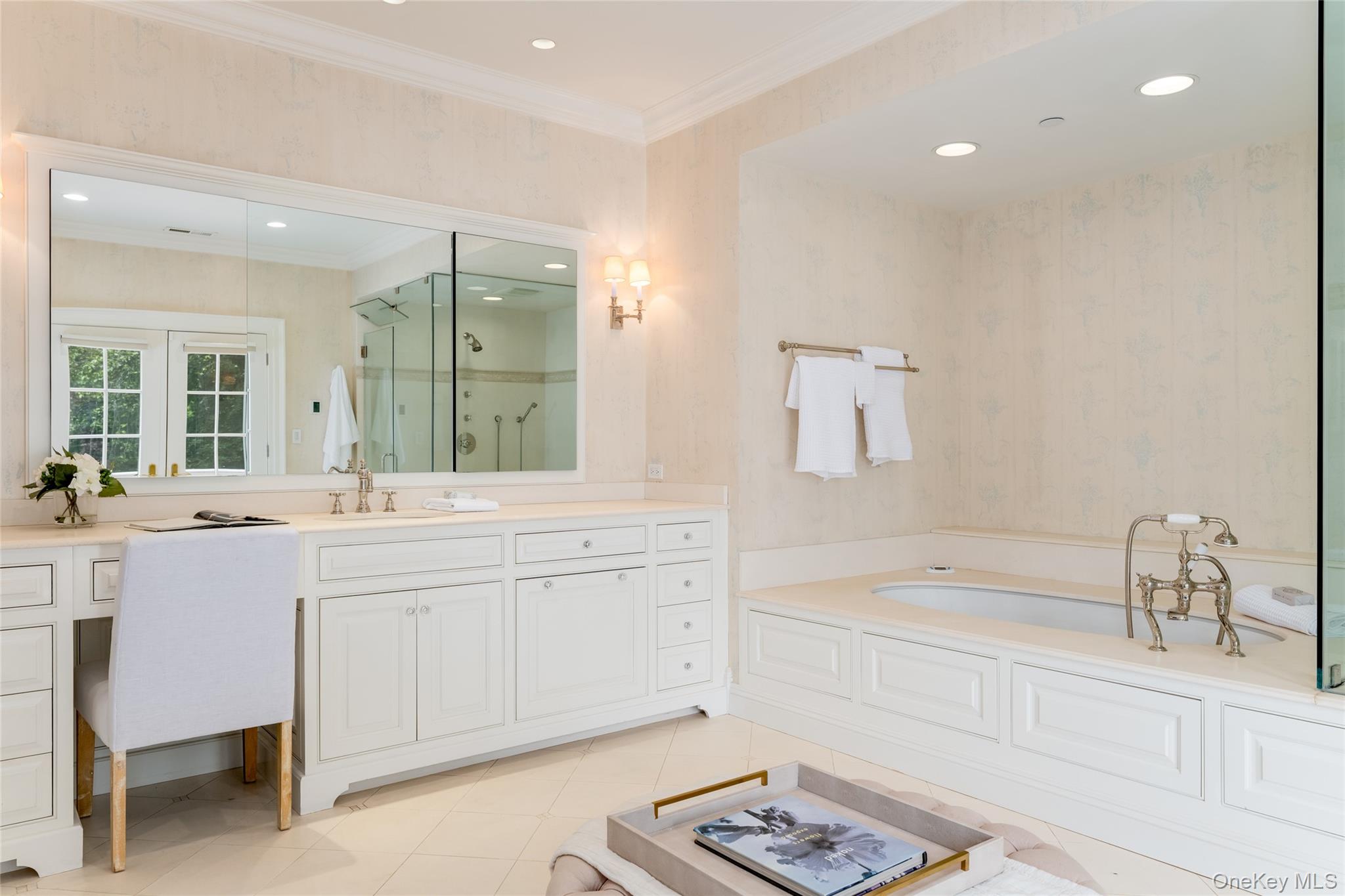 21 Dorann Road Purchase, NY 10577 - Photo 27 of 39 a spacious bathroom with a tub sink and mirror