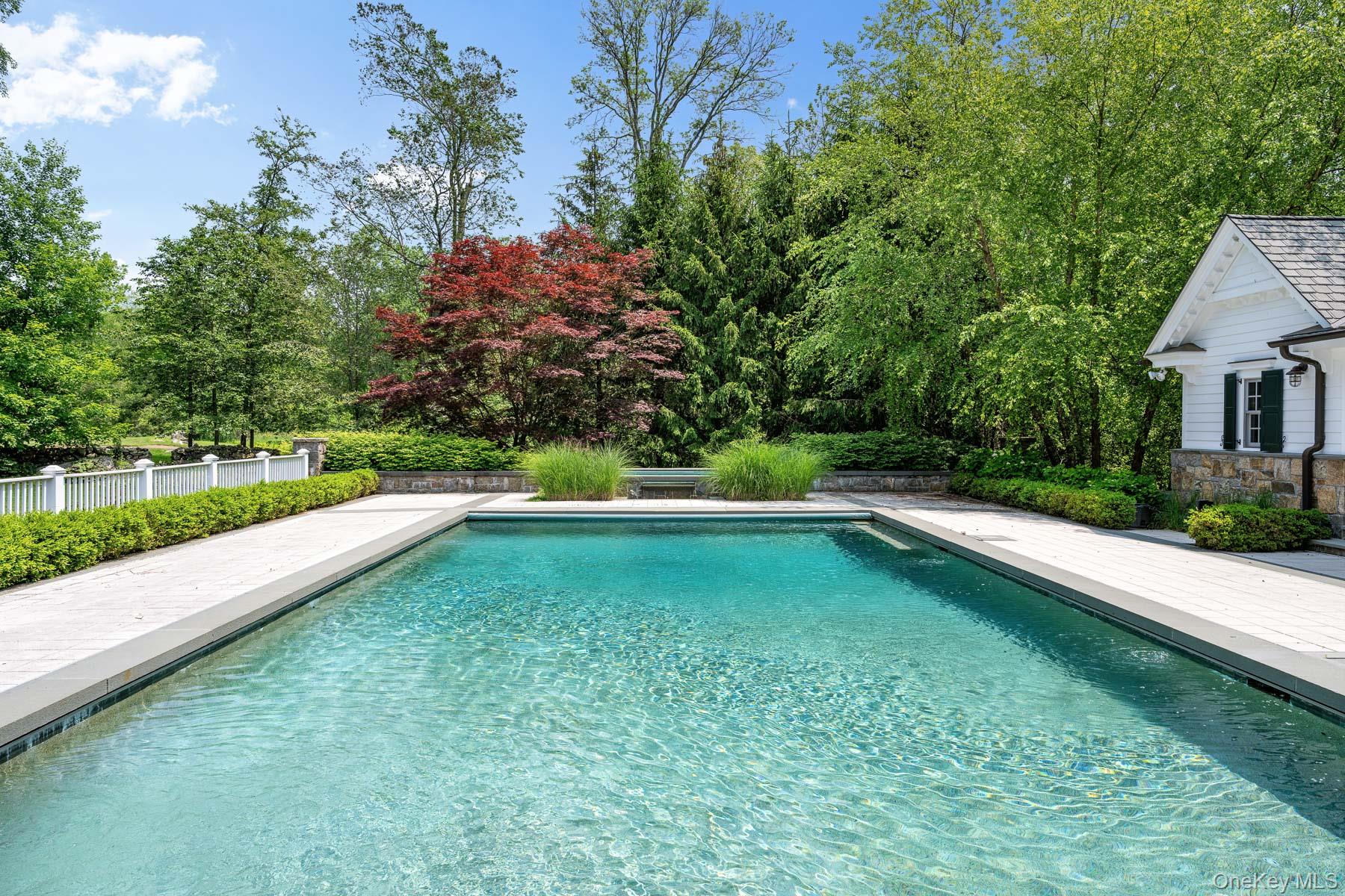 21 Dorann Road Purchase, NY 10577 - Photo 32 of 39 a view of a house with a yard