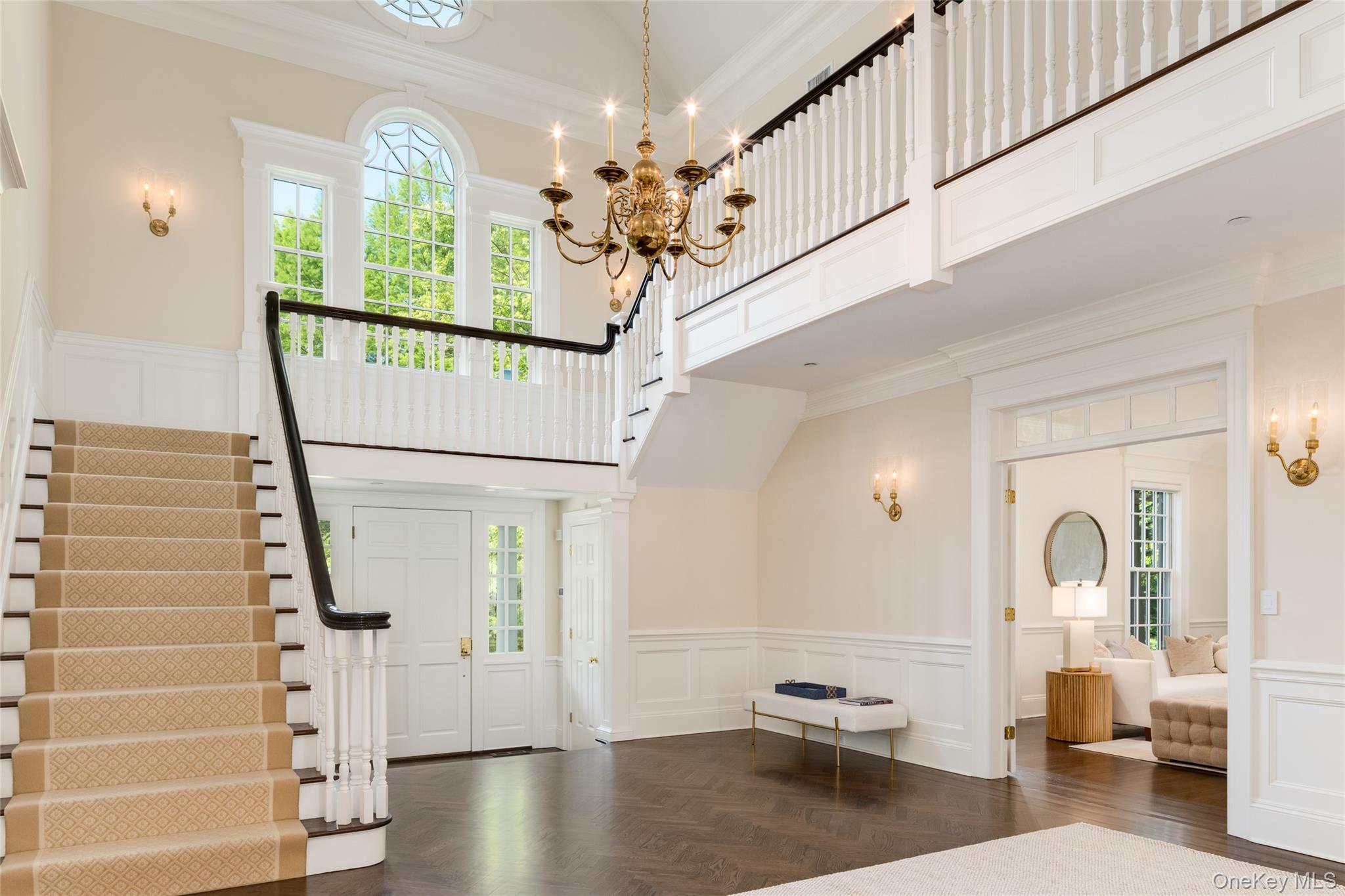 21 Dorann Road Purchase, NY 10577 - Photo 5 of 39 a living room with furniture and a chandelier