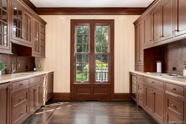 a kitchen with stainless steel appliances granite countertop a stove a sink and a cabinets