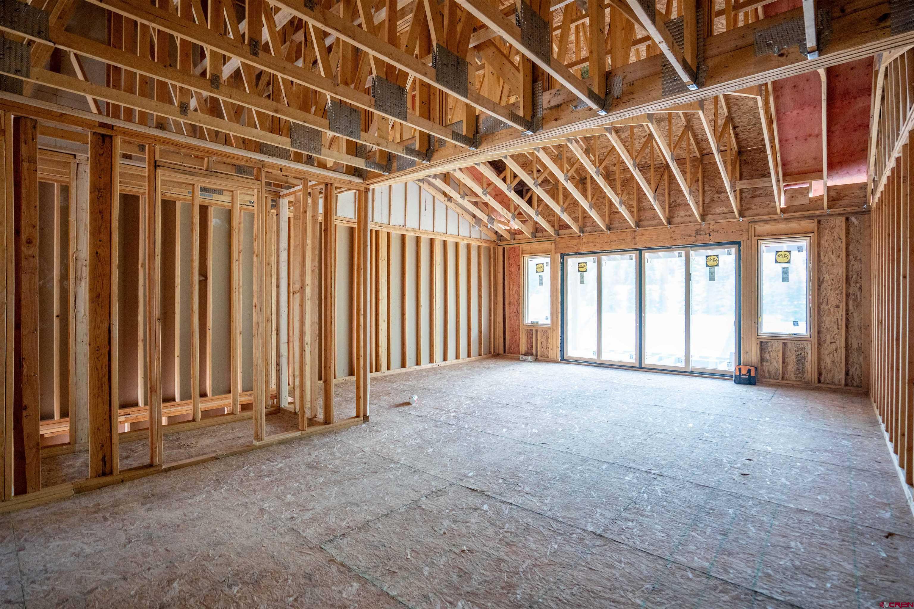 89 Travertine Trail Durango, CO 81301 - Photo 14 of 27 a view of an empty room with a window