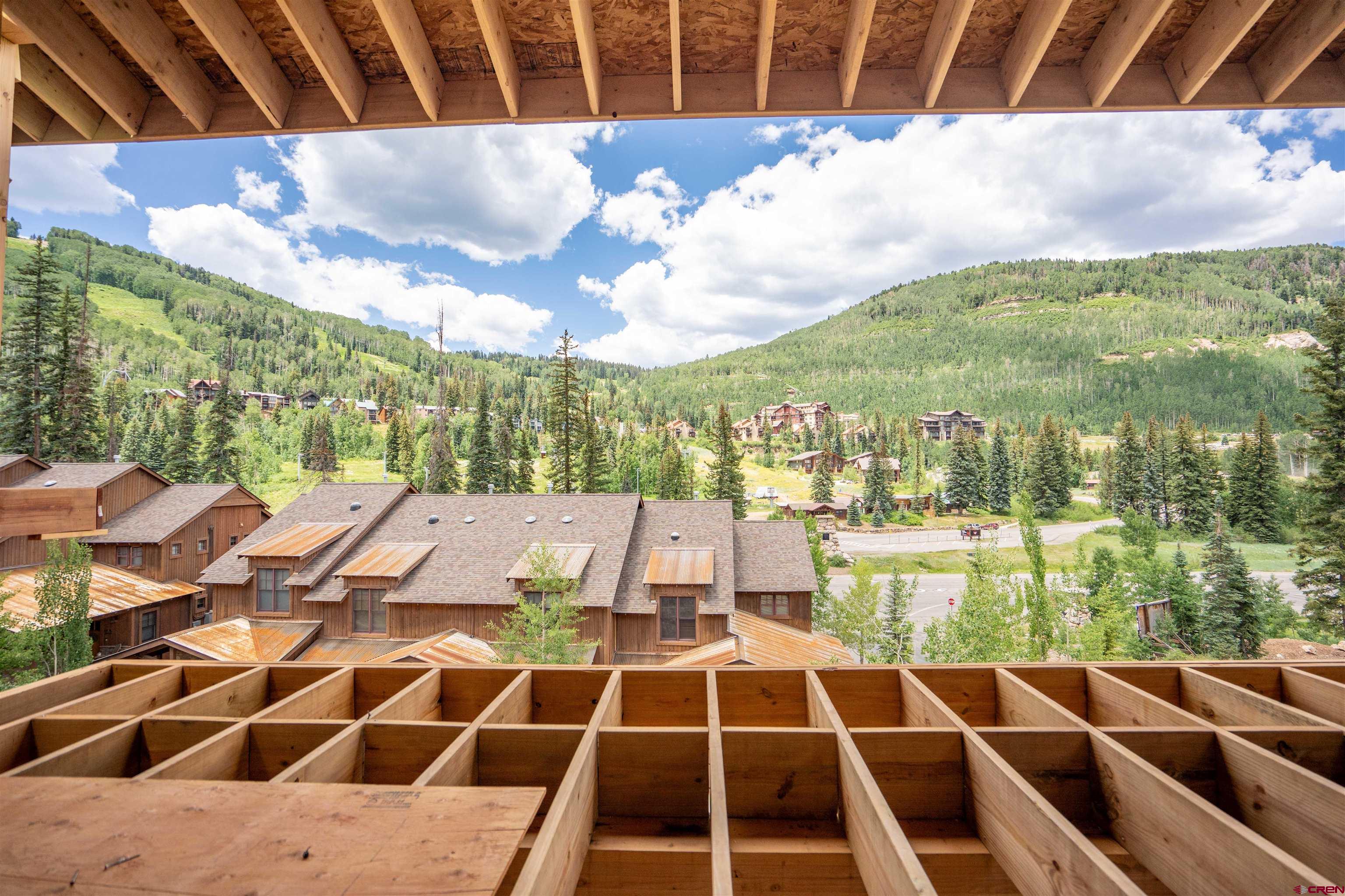 89 Travertine Trail Durango, CO 81301 - Photo 20 of 27 a view of a balcony with table and chairs