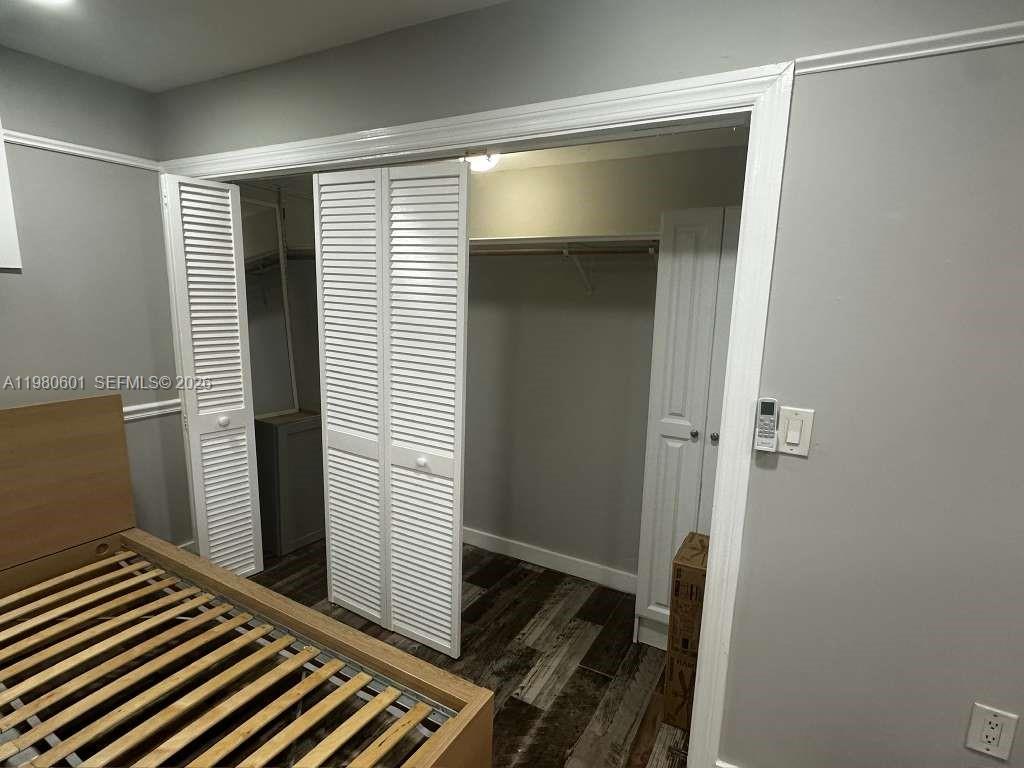 6837 Southwest 39th Terrace, Unit B Miami, FL 33155 - Photo 3 of 16 a bathroom with a sink and shower