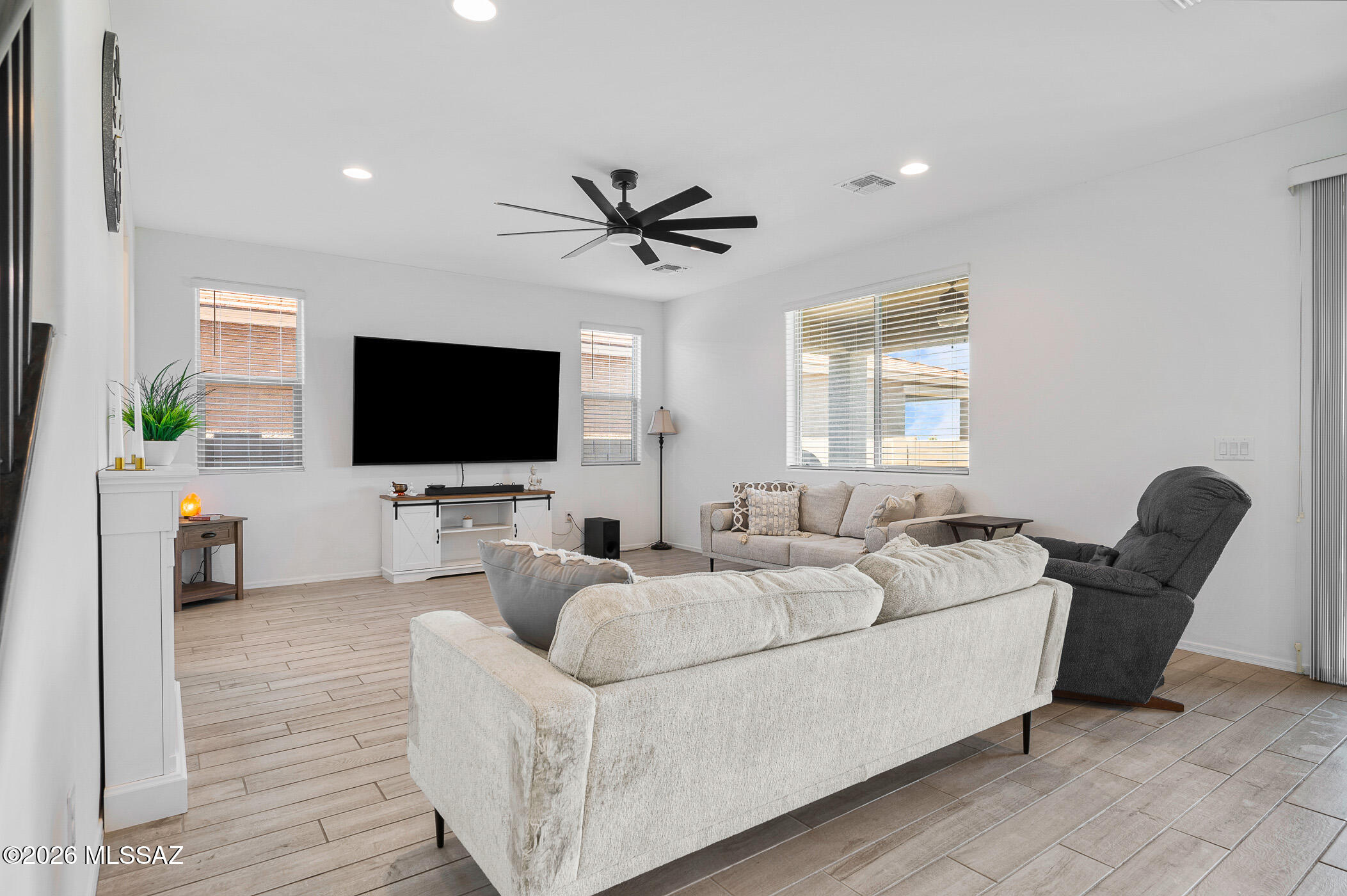 12092 East Ryscott Circle Vail, AZ 85641 - Photo 9 of 49 a living room with furniture and a flat screen tv