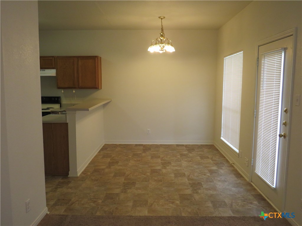 5804 Hamza Circle Killeen, TX 76542 - Photo 5 of 18 a view of a livingroom with a chandelier