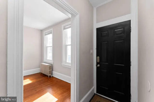a view of an empty room and window