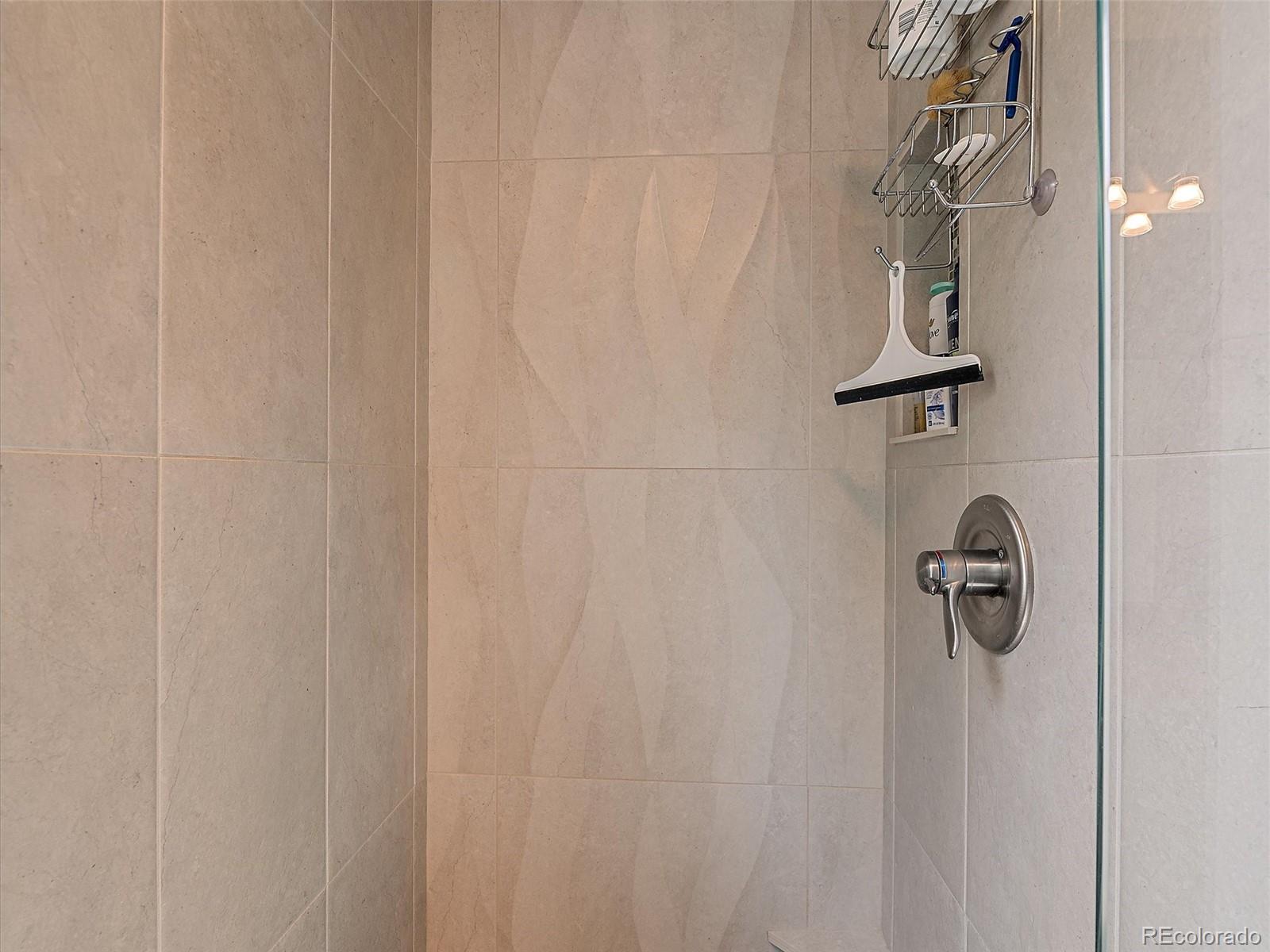 31412 North Bermuda Dunes Drive Evergreen, CO 80439 - Photo 28 of 46 a bathroom with a shower