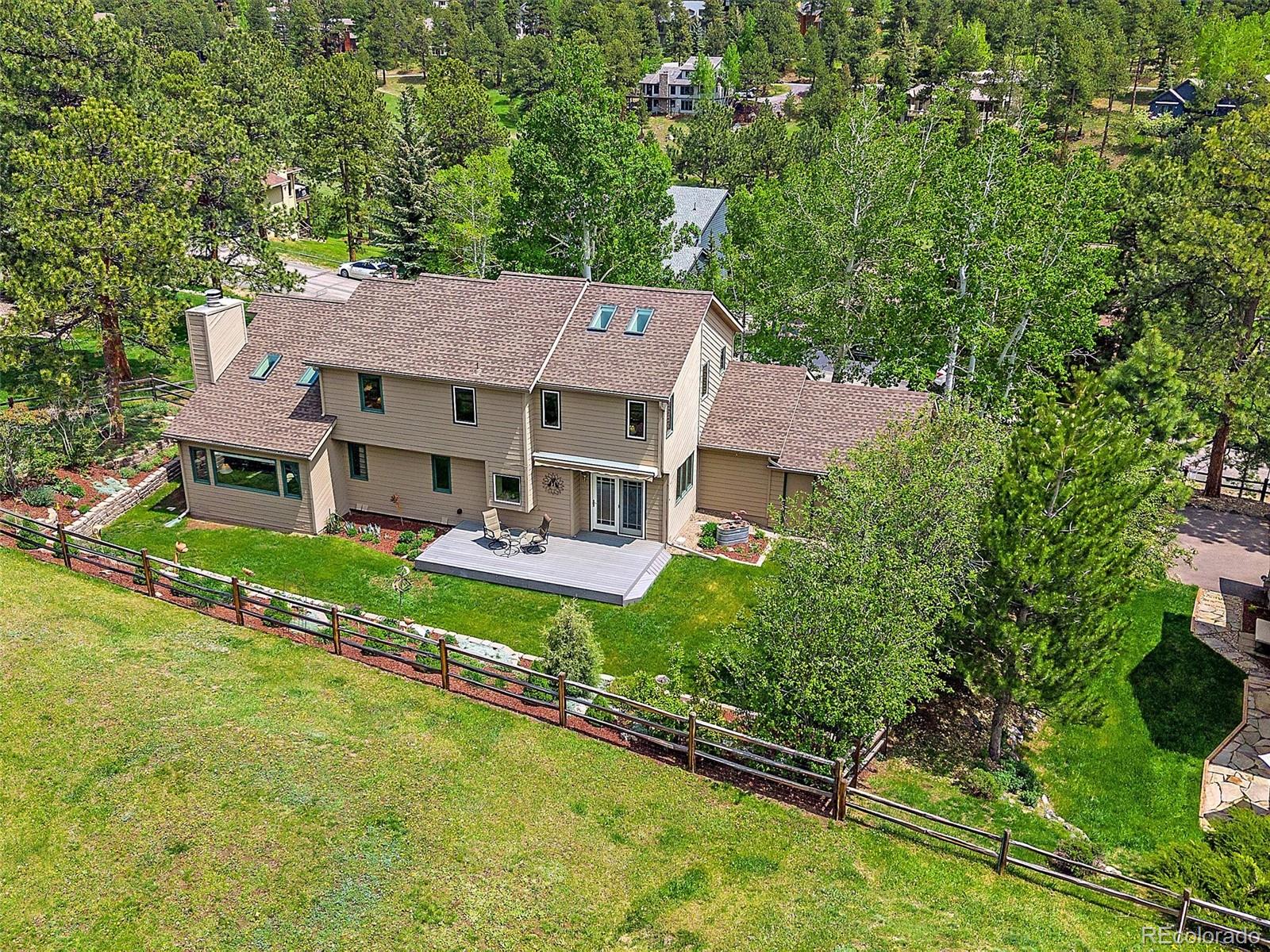31412 North Bermuda Dunes Drive Evergreen, CO 80439 - Photo 38 of 46 an aerial view of a house