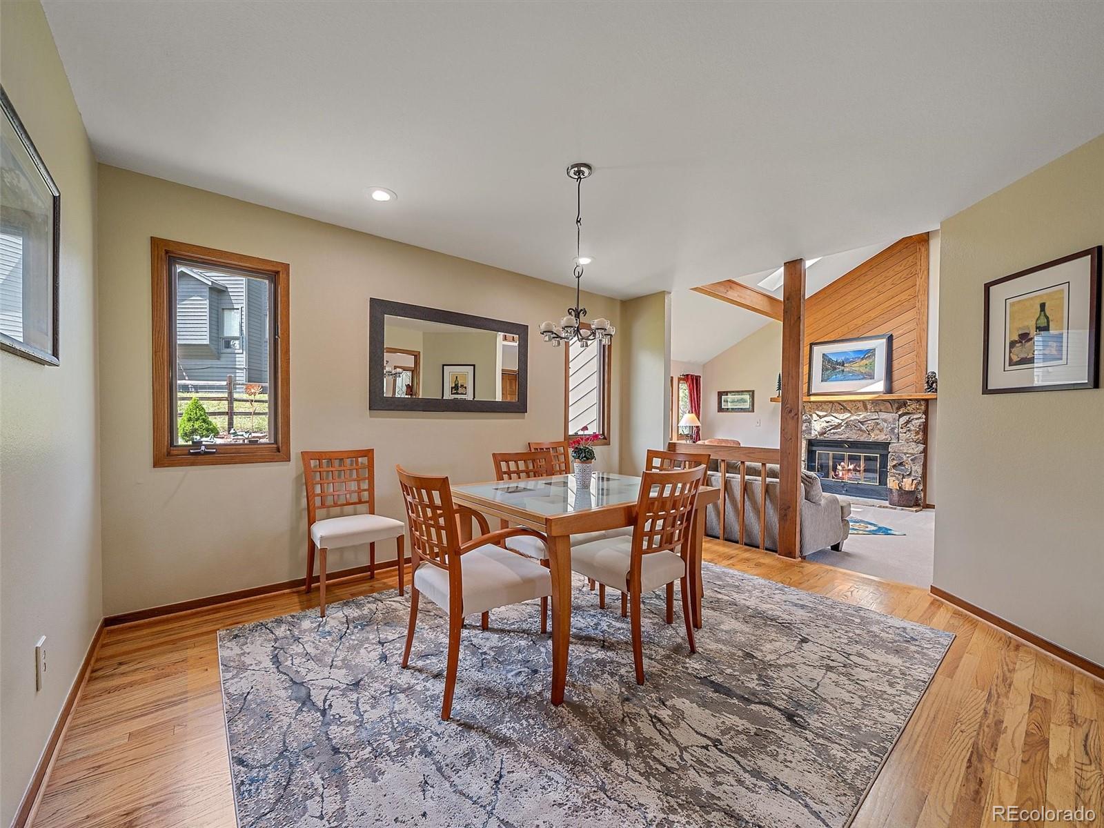 31412 North Bermuda Dunes Drive Evergreen, CO 80439 - Photo 9 of 46 a view of a dining room with furniture