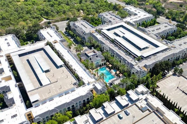 a living room with fireplace furniture and a chandelier