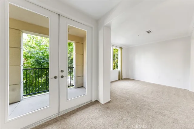 an empty room with windows