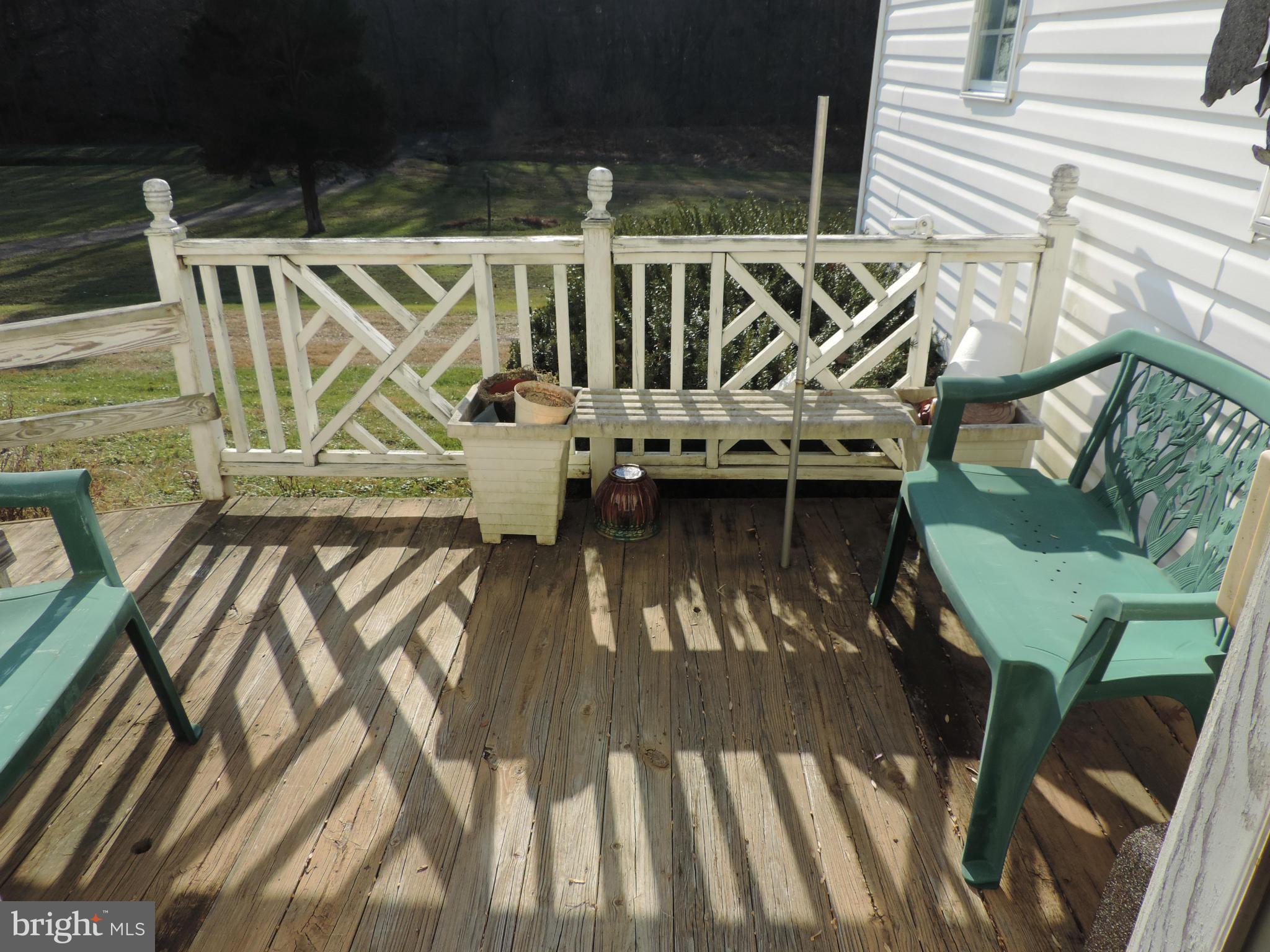 9215 Hawkins Creamery Road Gaithersburg, MD 20882 - Photo 13 of 23 a view of deck with patio