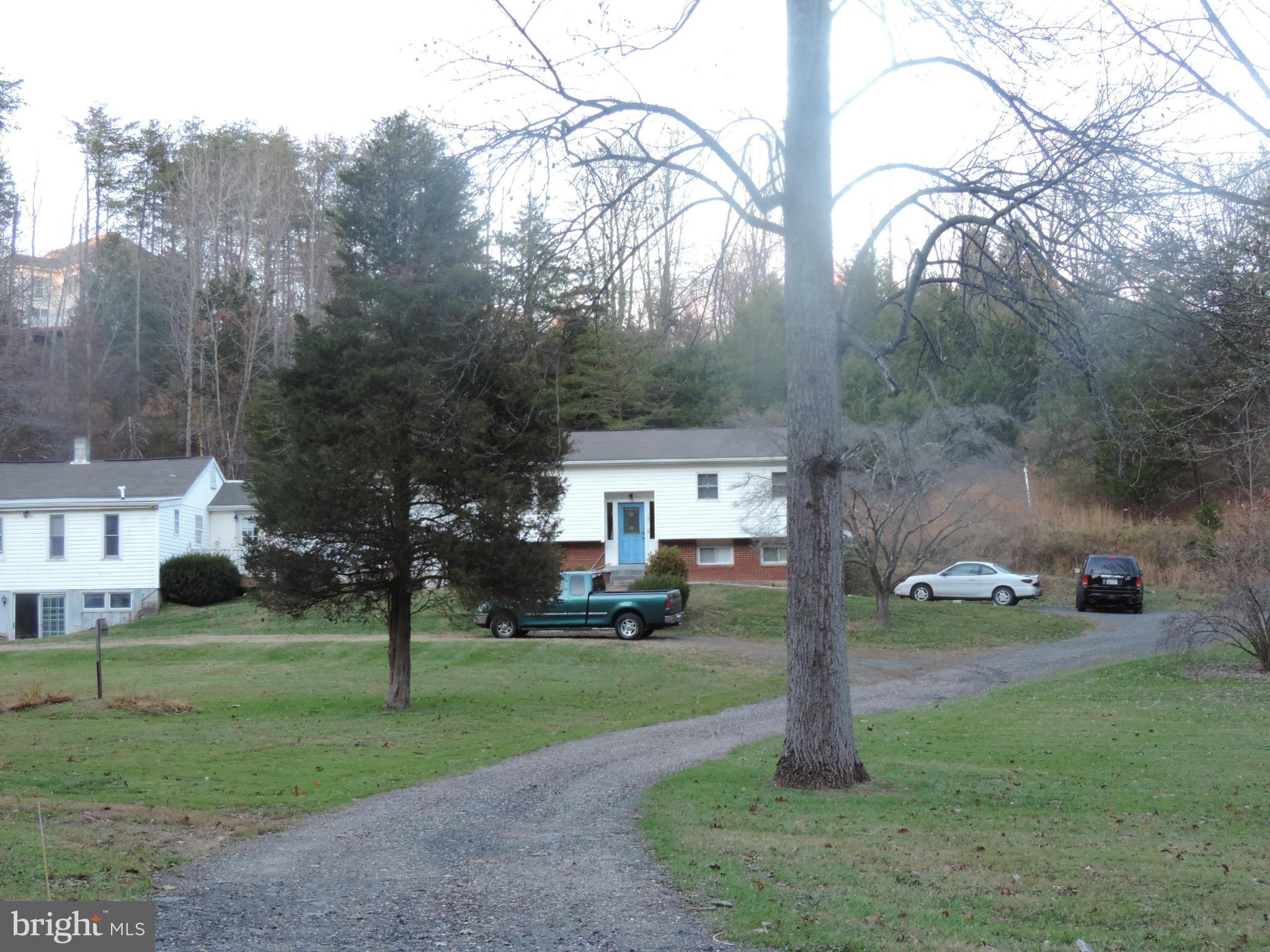 9215 Hawkins Creamery Road Gaithersburg, MD 20882 - Photo 22 of 23 a view of a park with large trees