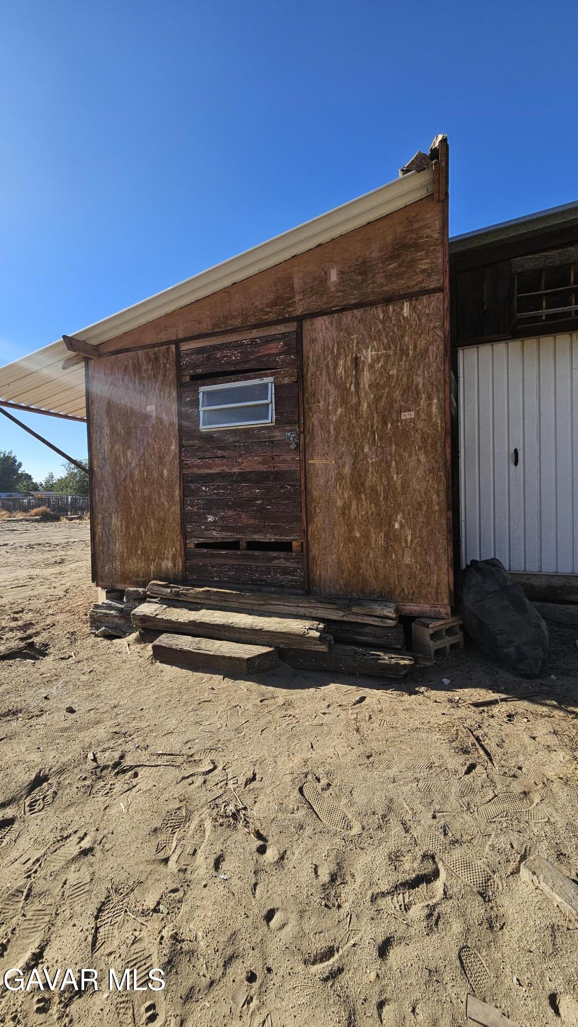 a view of outdoor space parking space and yard