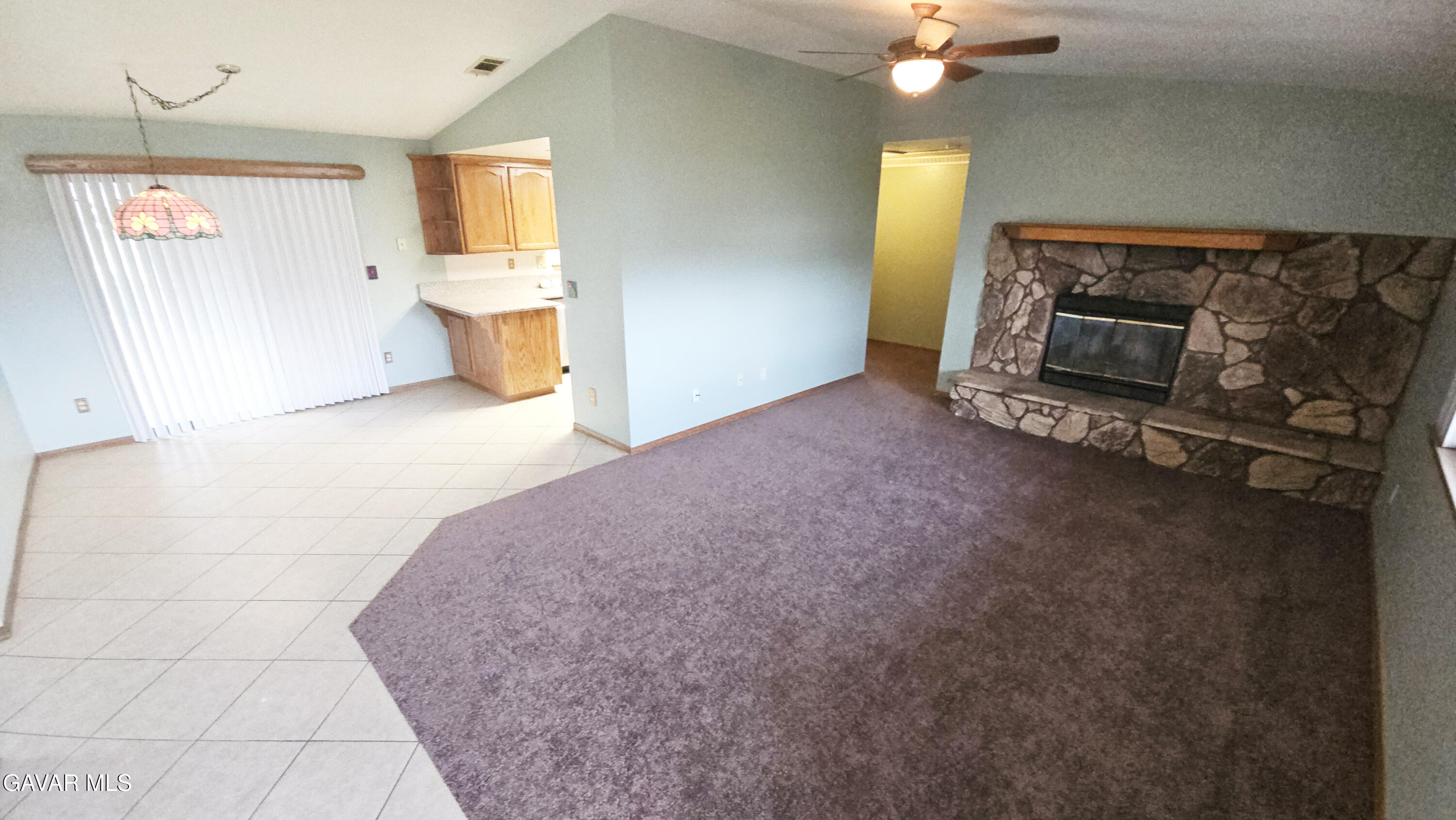 40985 174th Street East Lancaster, CA 93535 - Photo 15 of 33 a living room with furniture and a fireplace