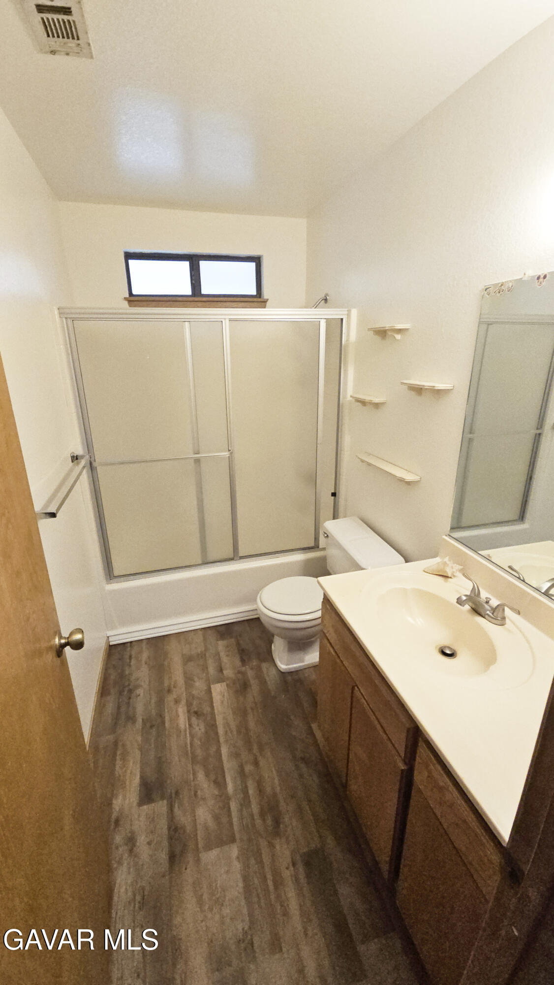 40985 174th Street East Lancaster, CA 93535 - Photo 23 of 33 a bathroom with a sink a toilet and shower