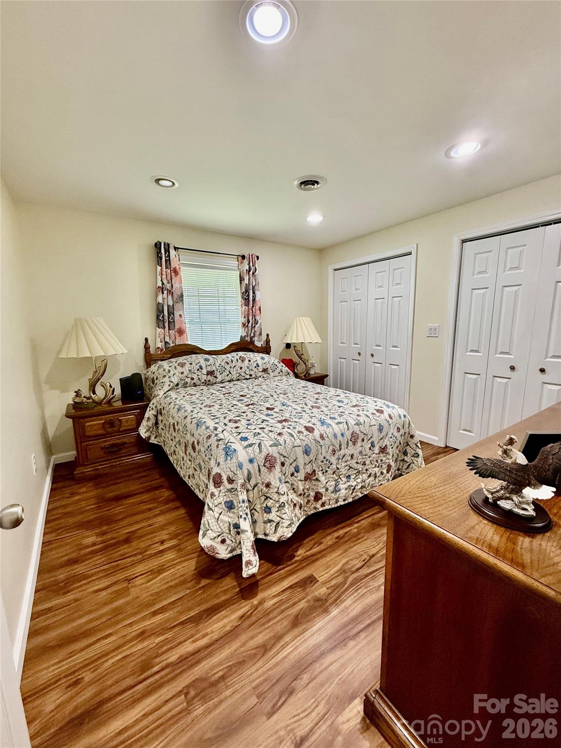 108 Scott Street Morganton, NC 28655 - Photo 13 of 21 a bedroom with a bed and wooden floor