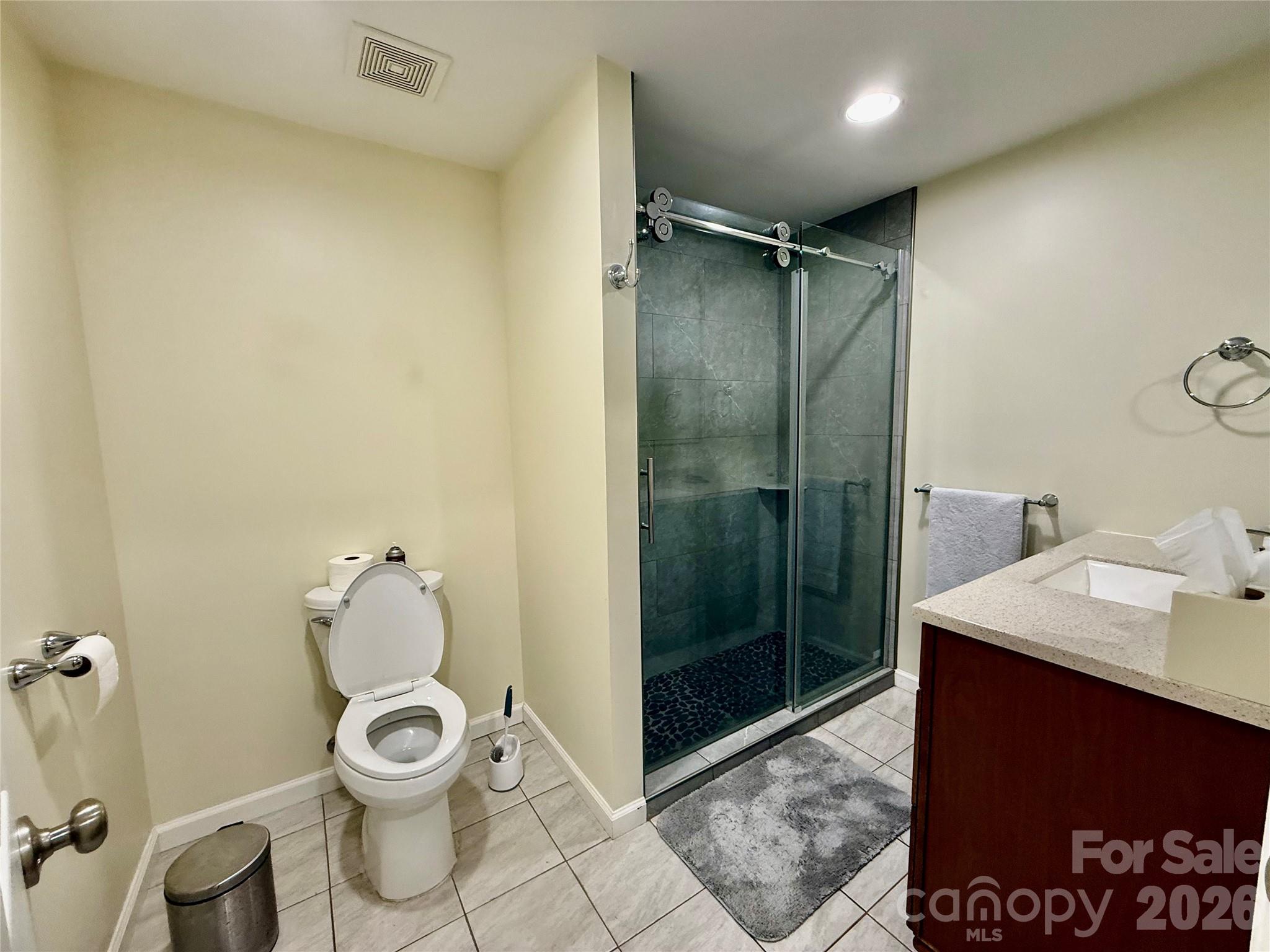 108 Scott Street Morganton, NC 28655 - Photo 15 of 21 a bathroom with a toilet and a shower