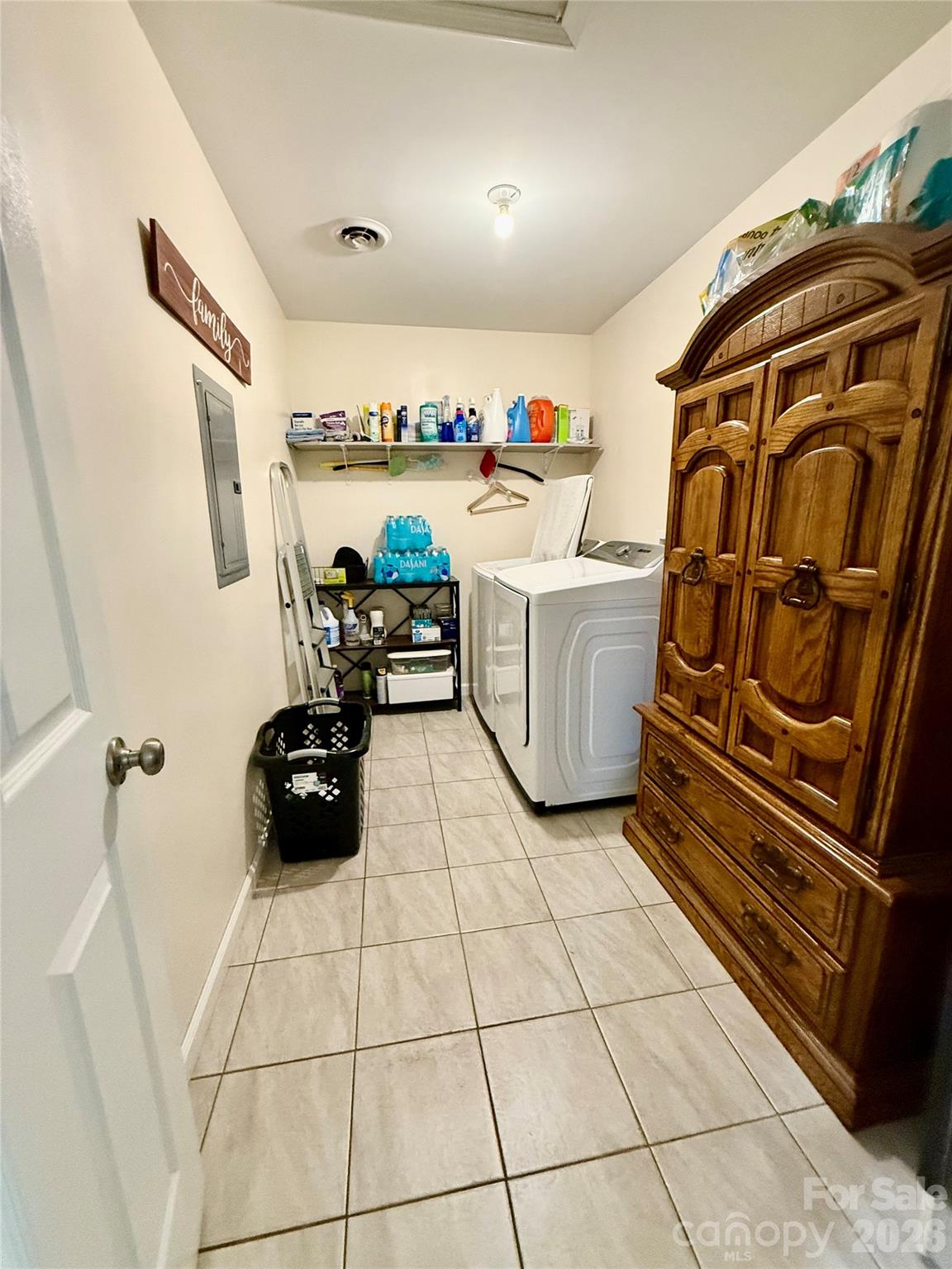 108 Scott Street Morganton, NC 28655 - Photo 16 of 21 a room with a cabinets and wooden floor