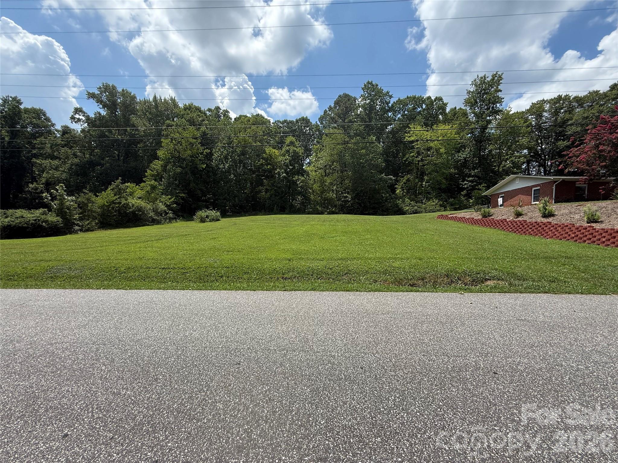 108 Scott Street Morganton, NC 28655 - Photo 6 of 21 a view of a golf course with parking space