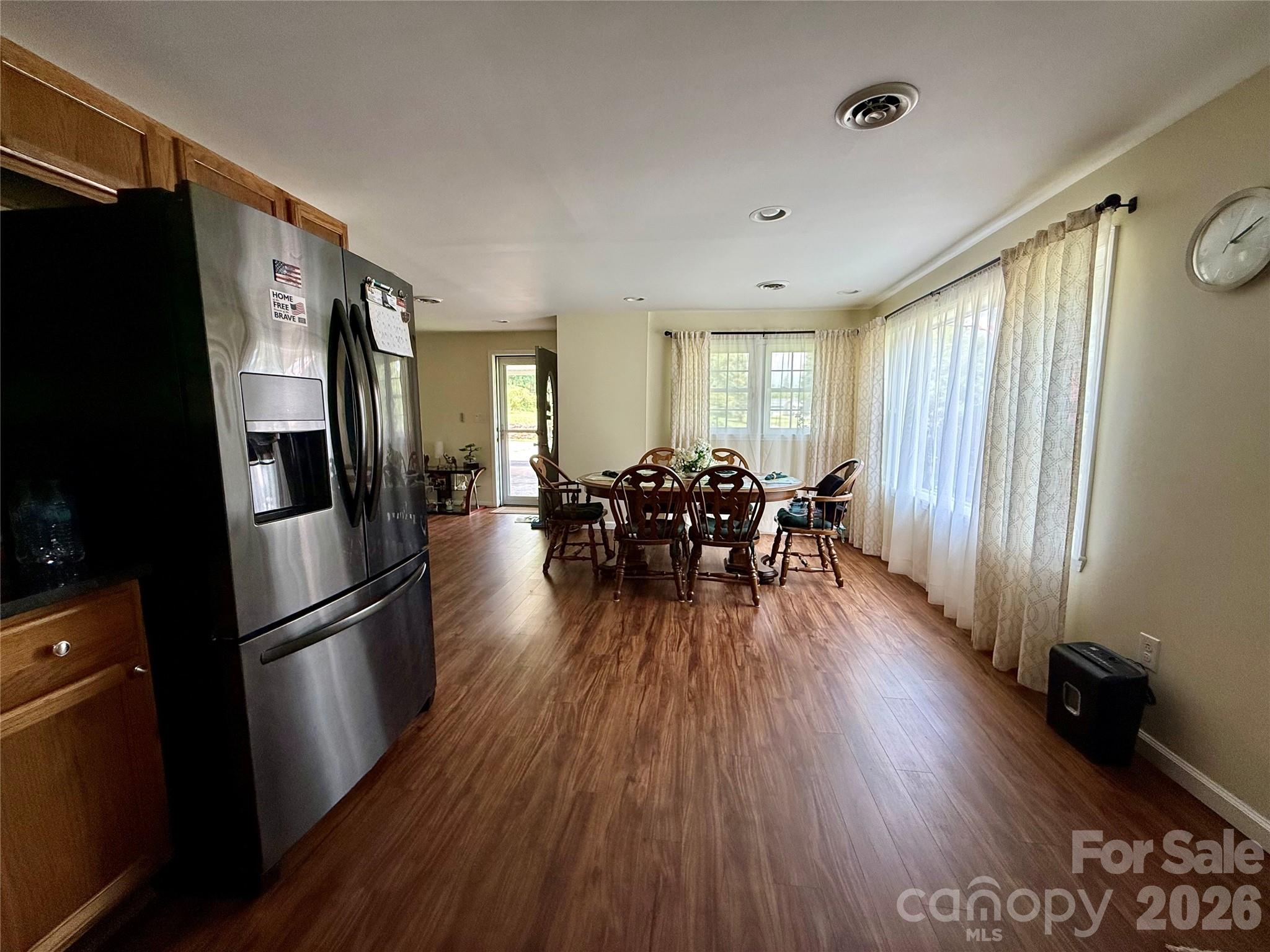 108 Scott Street Morganton, NC 28655 - Photo 8 of 21 a view of a dining room with furniture window and wooden floor