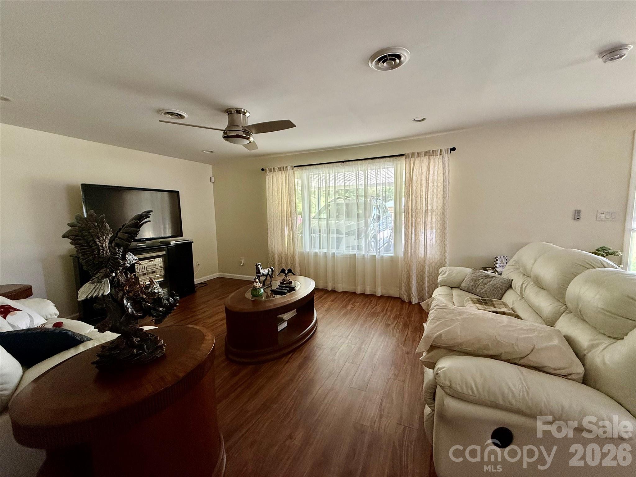 108 Scott Street Morganton, NC 28655 - Photo 9 of 21 a living room with furniture and wooden floor