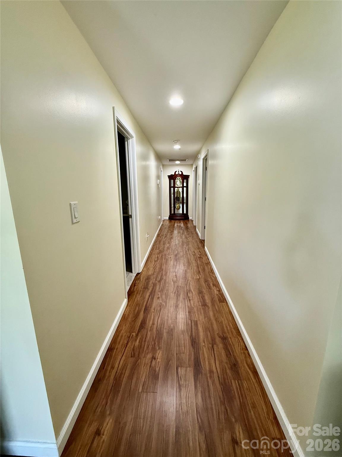 108 Scott Street Morganton, NC 28655 - Photo 10 of 21 a view of a hallway with wooden floor