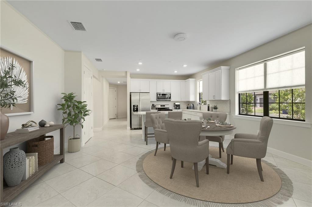 17301 Via Corsini Way Fort Myers, FL 33913 - Photo 2 of 17 a view of a dining room with furniture