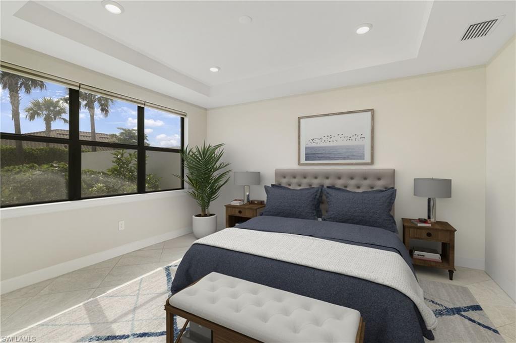 17301 Via Corsini Way Fort Myers, FL 33913 - Photo 6 of 17 a bedroom with a large bed and a window