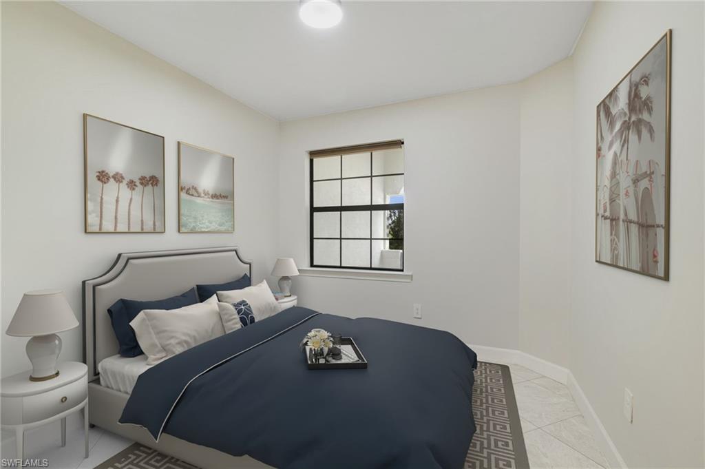17301 Via Corsini Way Fort Myers, FL 33913 - Photo 7 of 17 a bedroom with a bed and a window