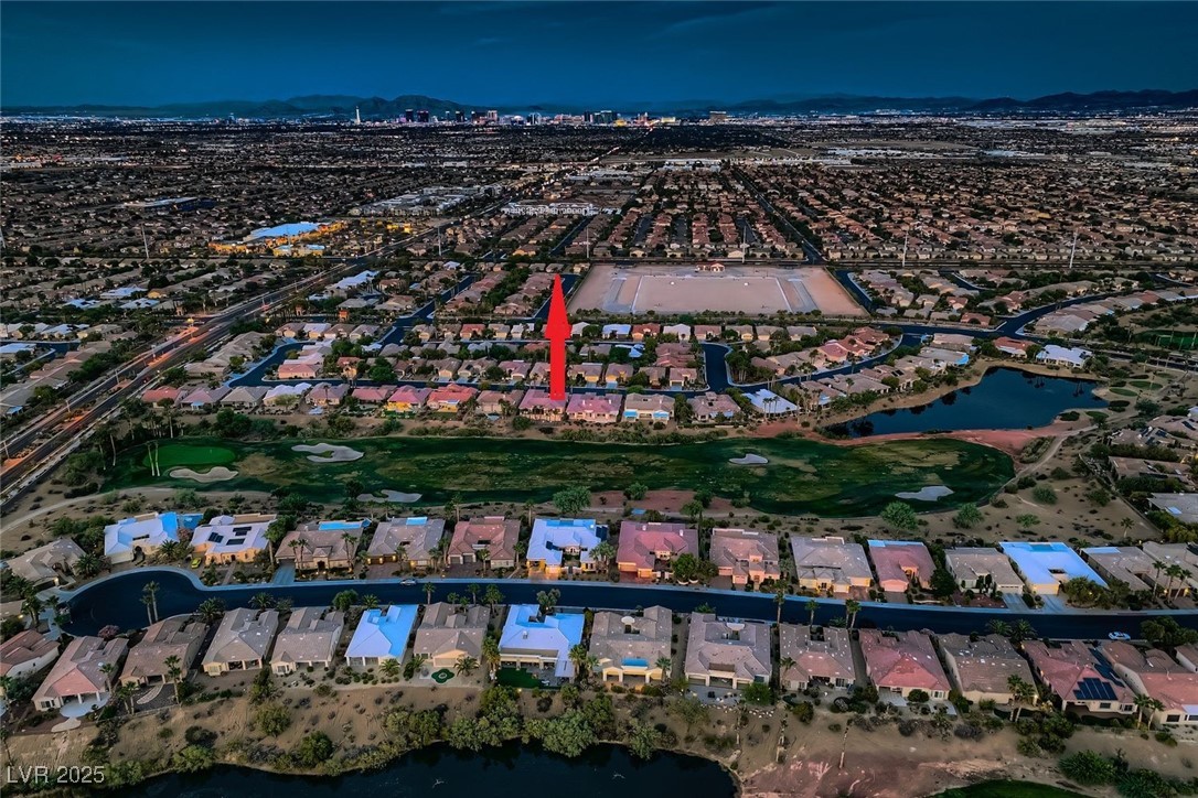 5015 Rivedro Street Las Vegas, NV 89135 - Photo 22 of 63 This elevated perspective highlights the property's enviable location just moments from the iconic Las Vegas Strip. With world-class entertainment, dining, and shopping nearby, the home offers a rare blend of serene residential living and vibrant city access.