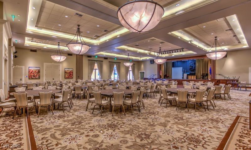 5015 Rivedro Street Las Vegas, NV 89135 - Photo 36 of 63 "The 7,200-square-foot Sunrise Ballroom serves as a vibrant venue for a variety of events, including New Year’s celebrations, elegant banquets, entertaining movie nights, live music, and captivating performances."