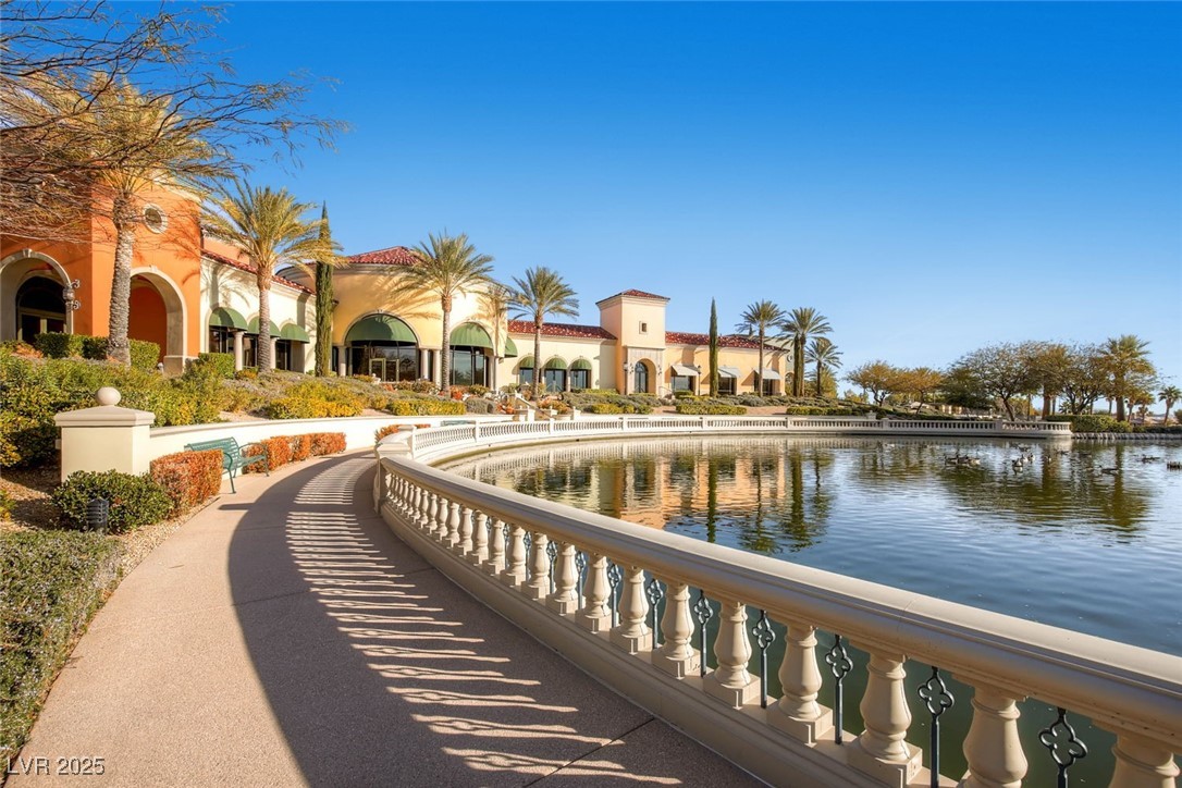 5015 Rivedro Street Las Vegas, NV 89135 - Photo 53 of 63 "Serene view of the Siena Community Center from the lakeside terrace — where Lake Siena provides a tranquil backdrop for gatherings and recreation."