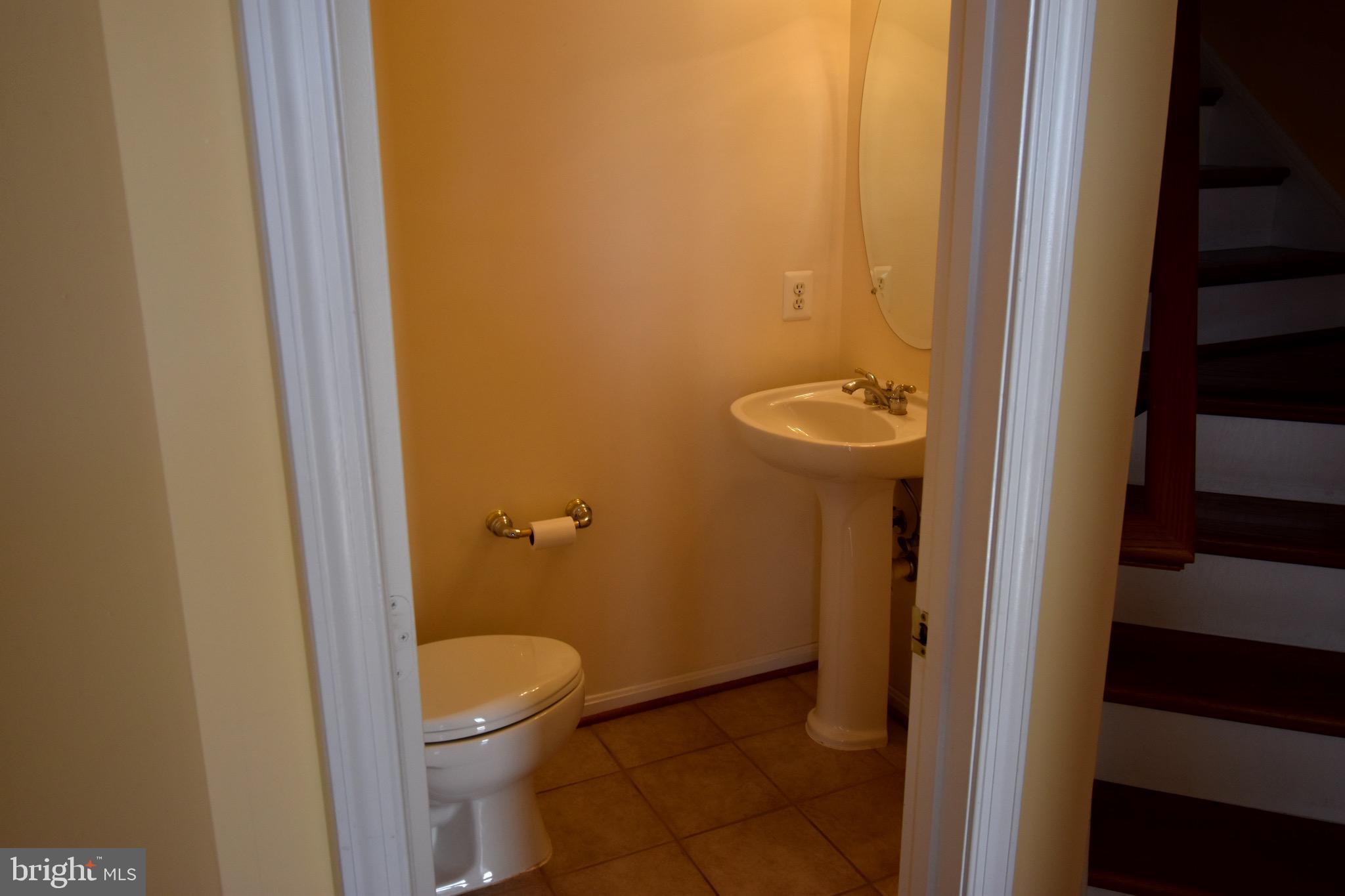 13571 Cedar Run Lane Herndon, VA 20171 - Photo 16 of 33 a bathroom with a granite countertop sink