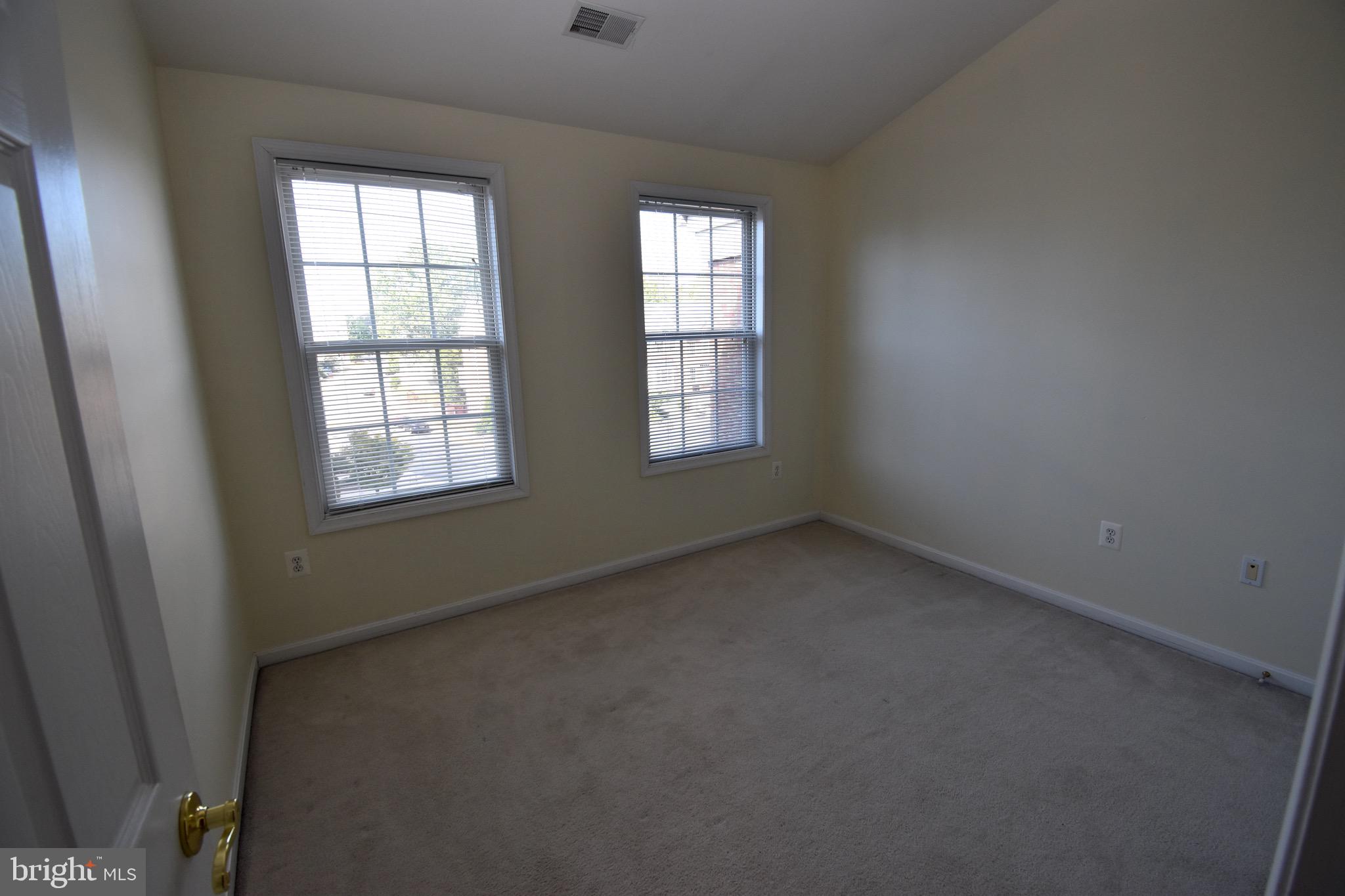 13571 Cedar Run Lane Herndon, VA 20171 - Photo 28 of 33 an empty room with windows