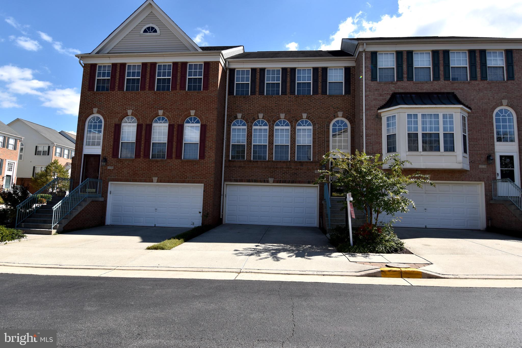 13571 Cedar Run Lane Herndon, VA 20171 - Photo 4 of 33 a front view of a house with a yard