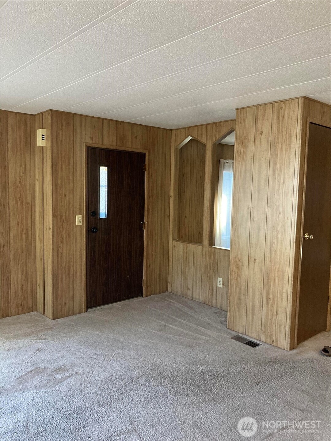 1841 Trosper Road Southwest, Unit 32 Tumwater, WA 98512 - Photo 10 of 13 an empty room with closet and mirror