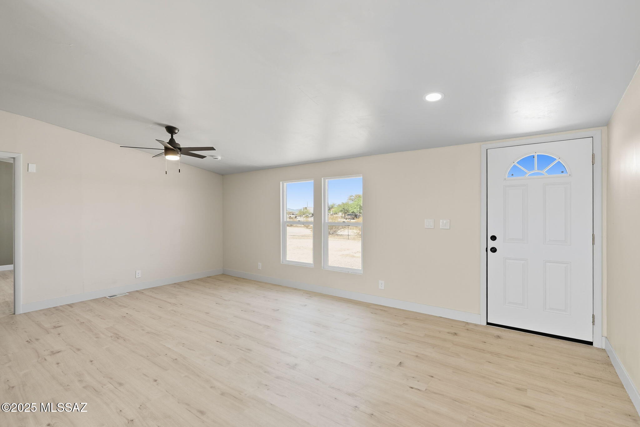 8790 North Trico Road Marana, AZ 85653 - Photo 6 of 35 an empty room with windows and closet