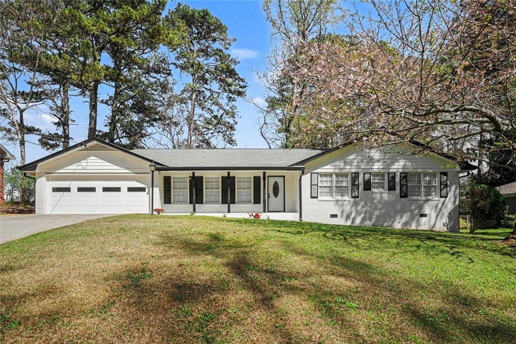 front view of a house with a yard