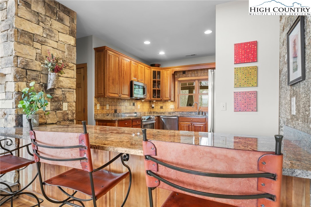 1690 Evergreen Drive Boone, NC 28607 - Photo 19 of 47 a room with table and chairs