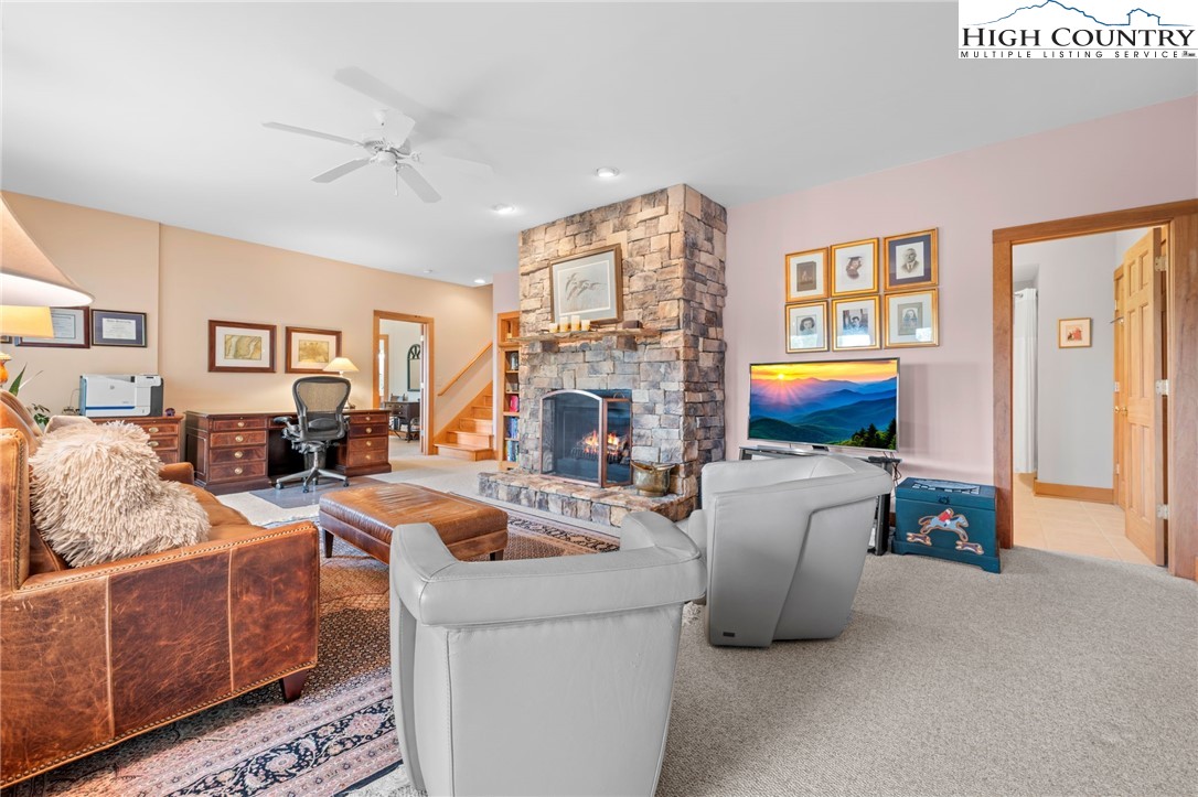 1690 Evergreen Drive Boone, NC 28607 - Photo 22 of 47 a living room with furniture fireplace and flat screen tv