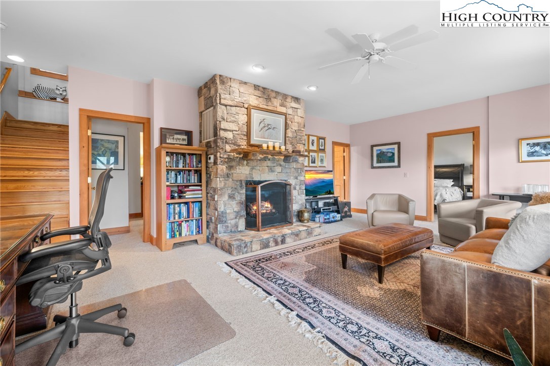 1690 Evergreen Drive Boone, NC 28607 - Photo 24 of 47 a living room with furniture and a fireplace