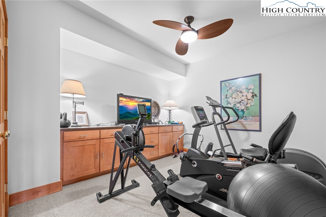1690 Evergreen Drive Boone, NC 28607 - Photo 25 of 47 a room with gym equipment and windows