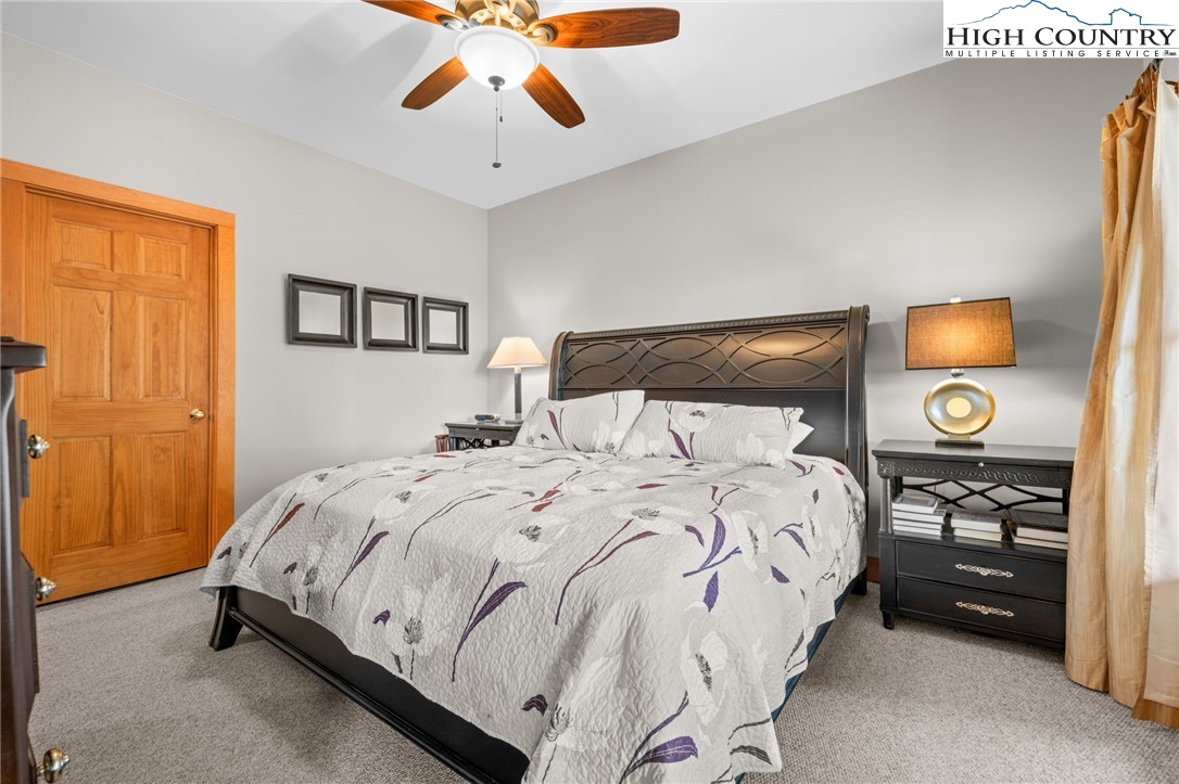 1690 Evergreen Drive Boone, NC 28607 - Photo 28 of 47 a bedroom with a bed and a tv