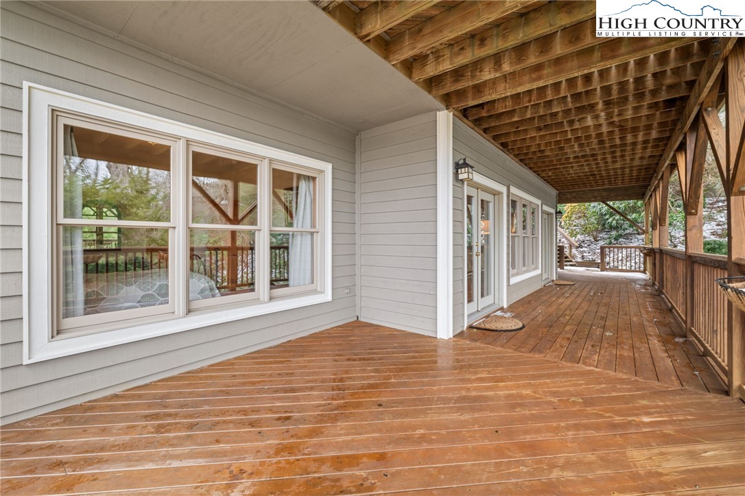 1690 Evergreen Drive Boone, NC 28607 - Photo 41 of 47 a view of an empty room with wooden floor and a window