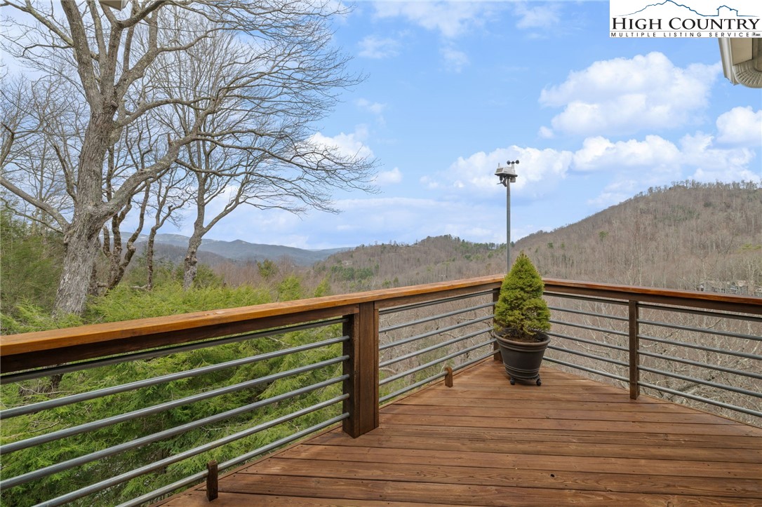1690 Evergreen Drive Boone, NC 28607 - Photo 42 of 47 a view of a balcony with wooden floor and outdoor space