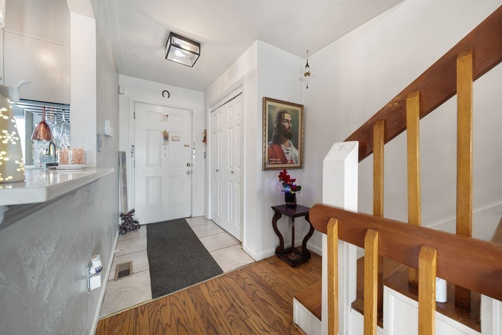 80 Ridge Road, Unit 80 Revere, MA 02151 - Photo 24 of 41 a living room with furniture and a window