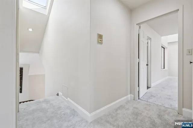 a kitchen with a counter space cabinets and appliances