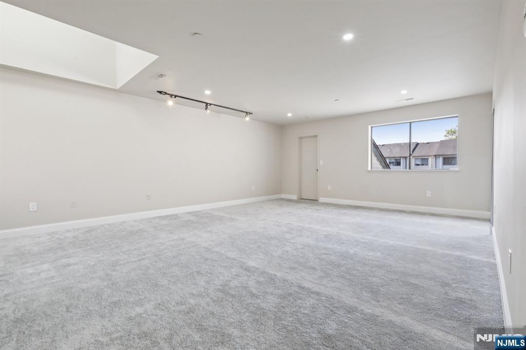 5 Millay Court Teaneck, NJ 07666 - Photo 19 of 36 a view of an empty room